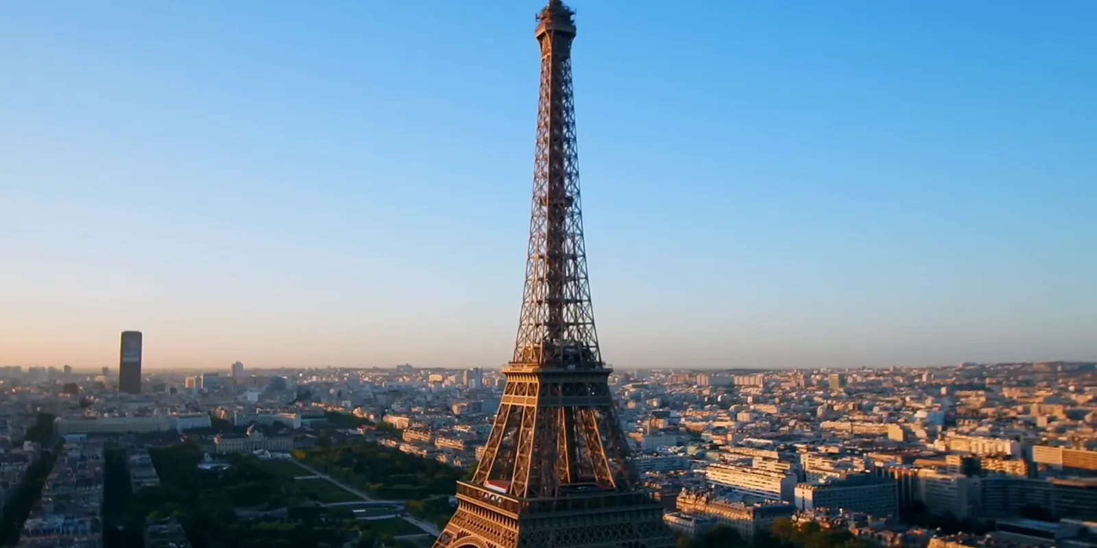 Paris rooftops and the Eiffel Tower at sunset